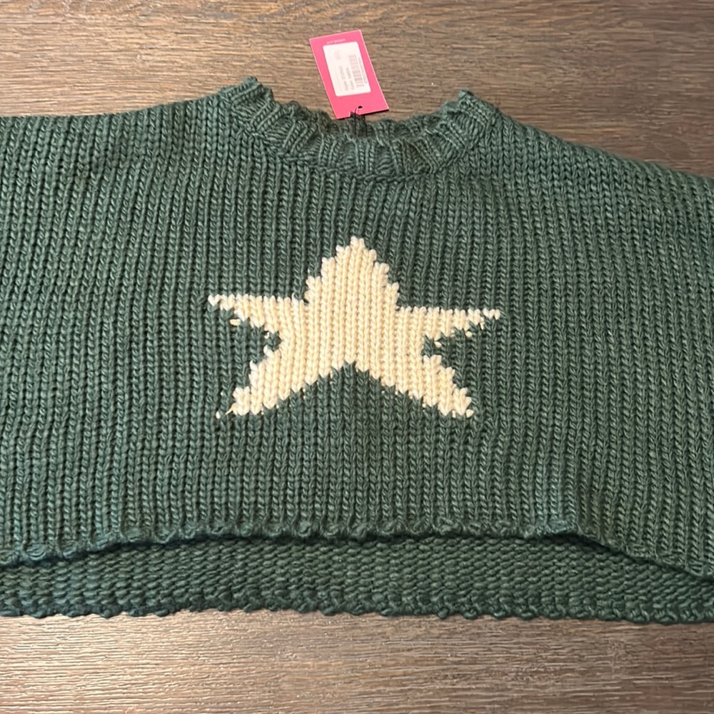 Green sweater with tags